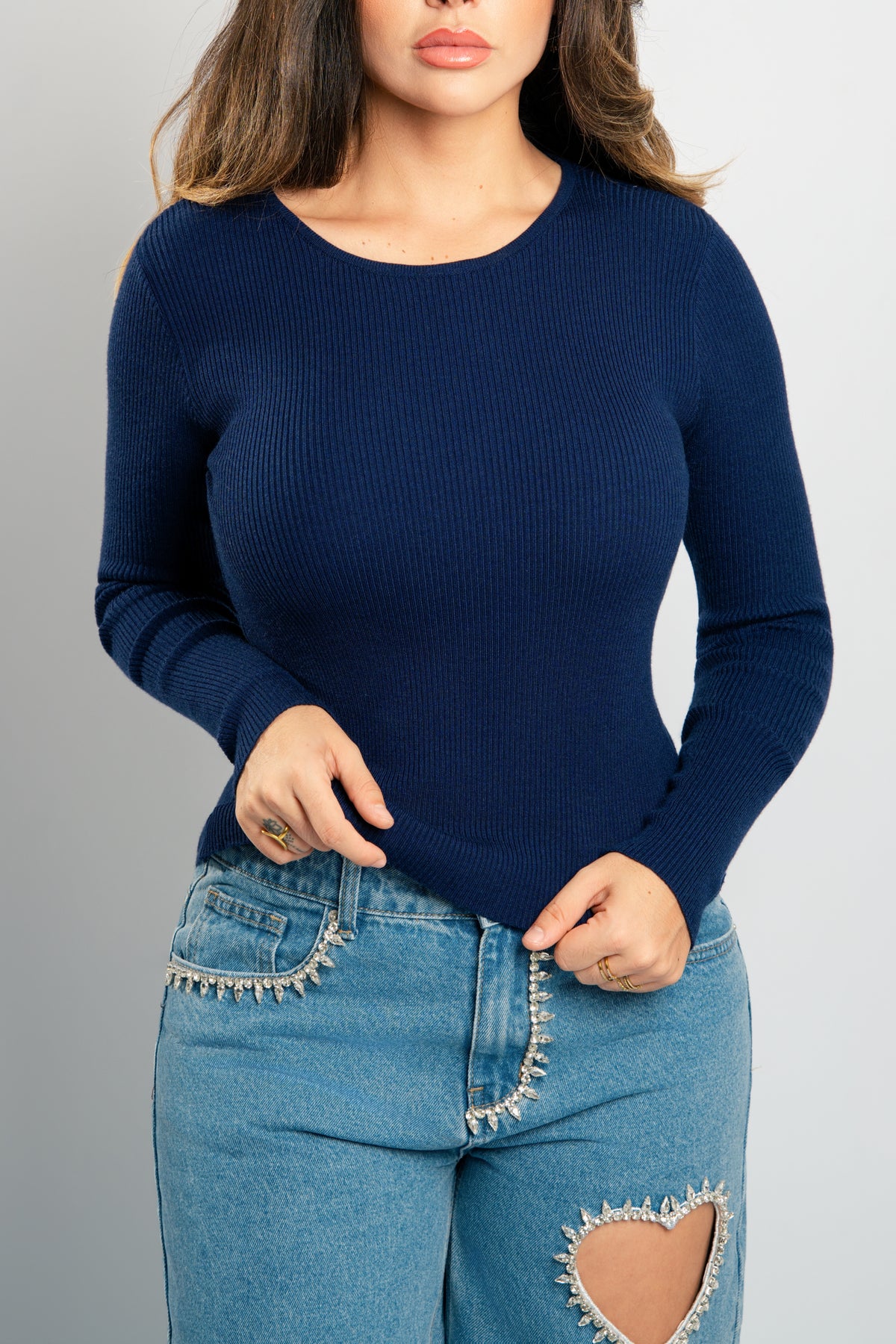 pull fin près du corp