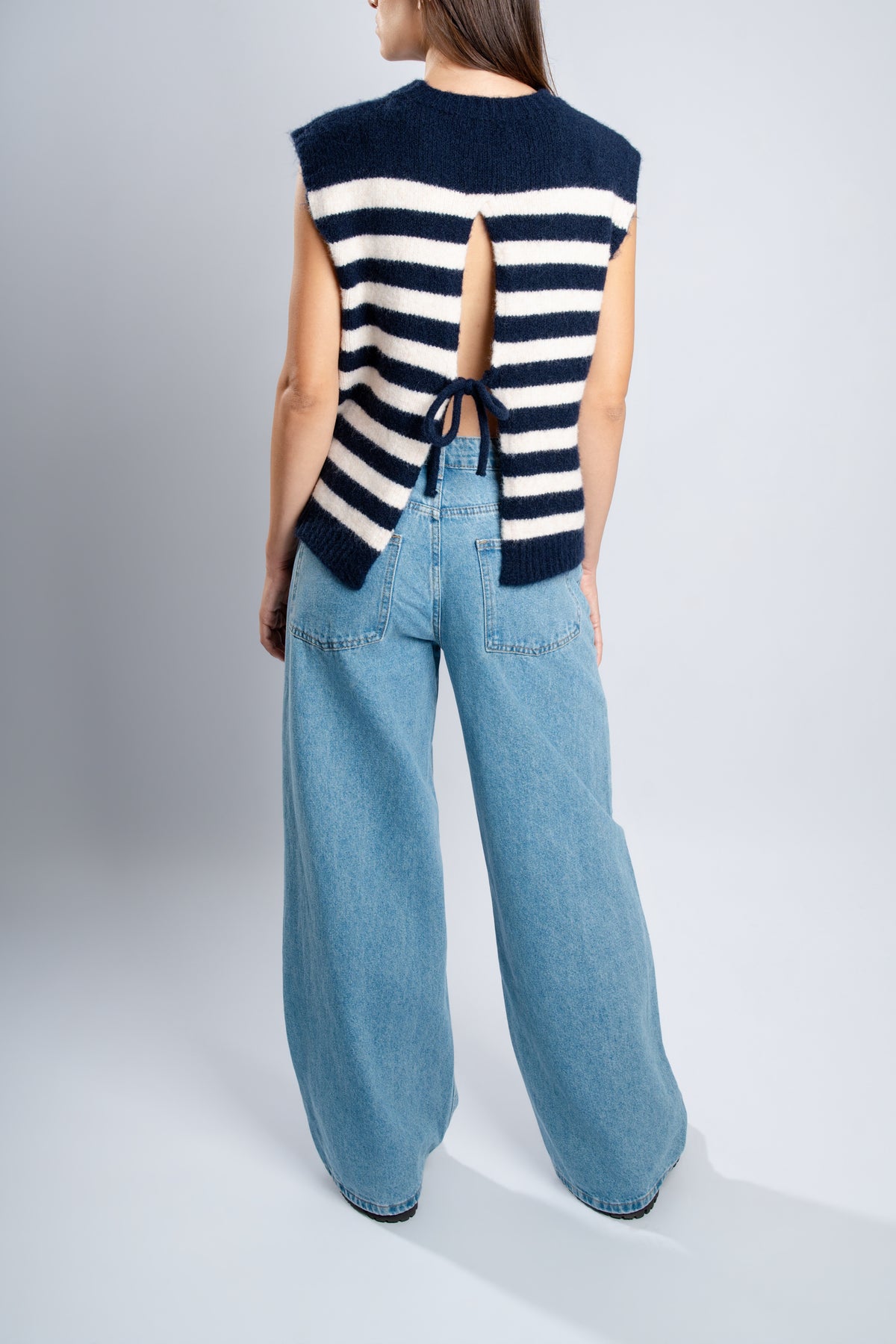 Pull sans manche dos nu