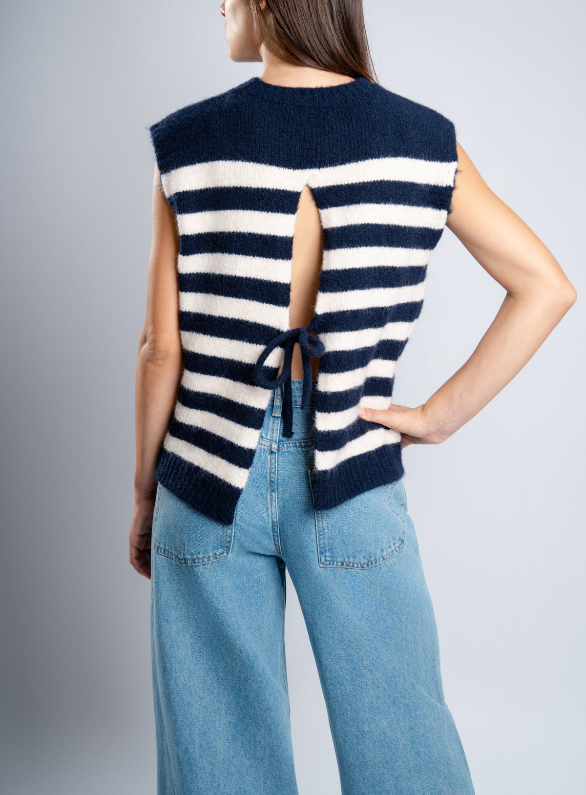 Pull sans manche dos nu