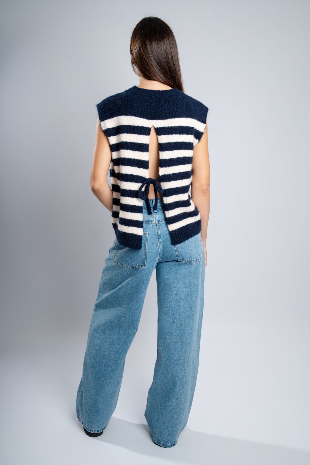 Pull sans manche dos nu