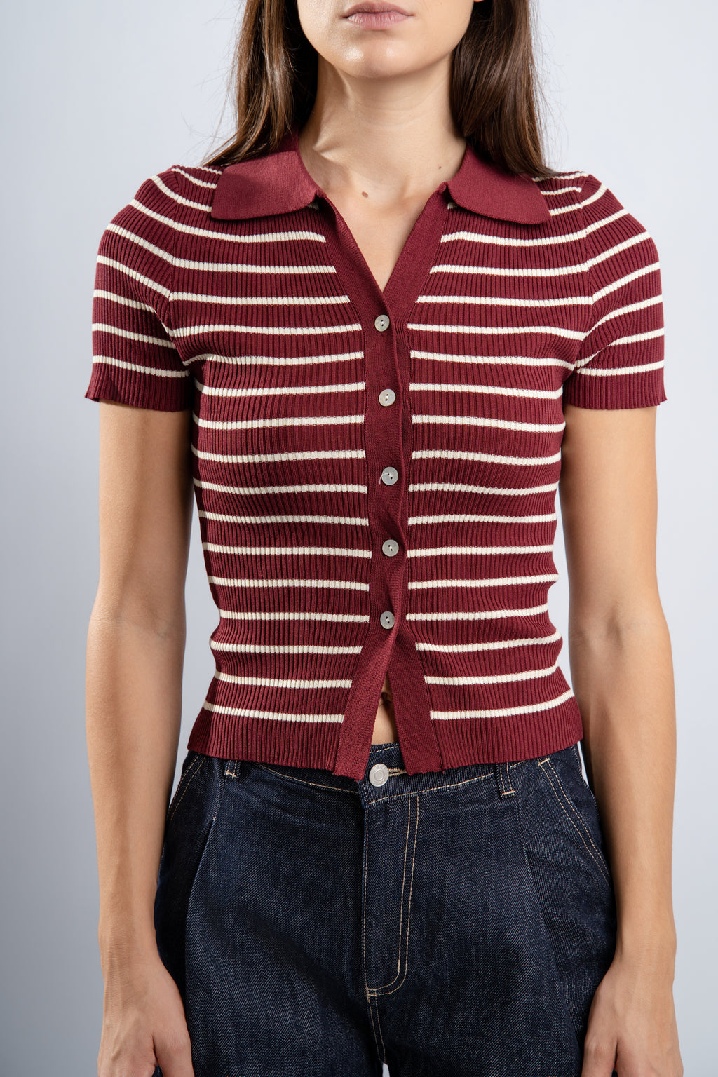 Polo rayé en maille bordeaux