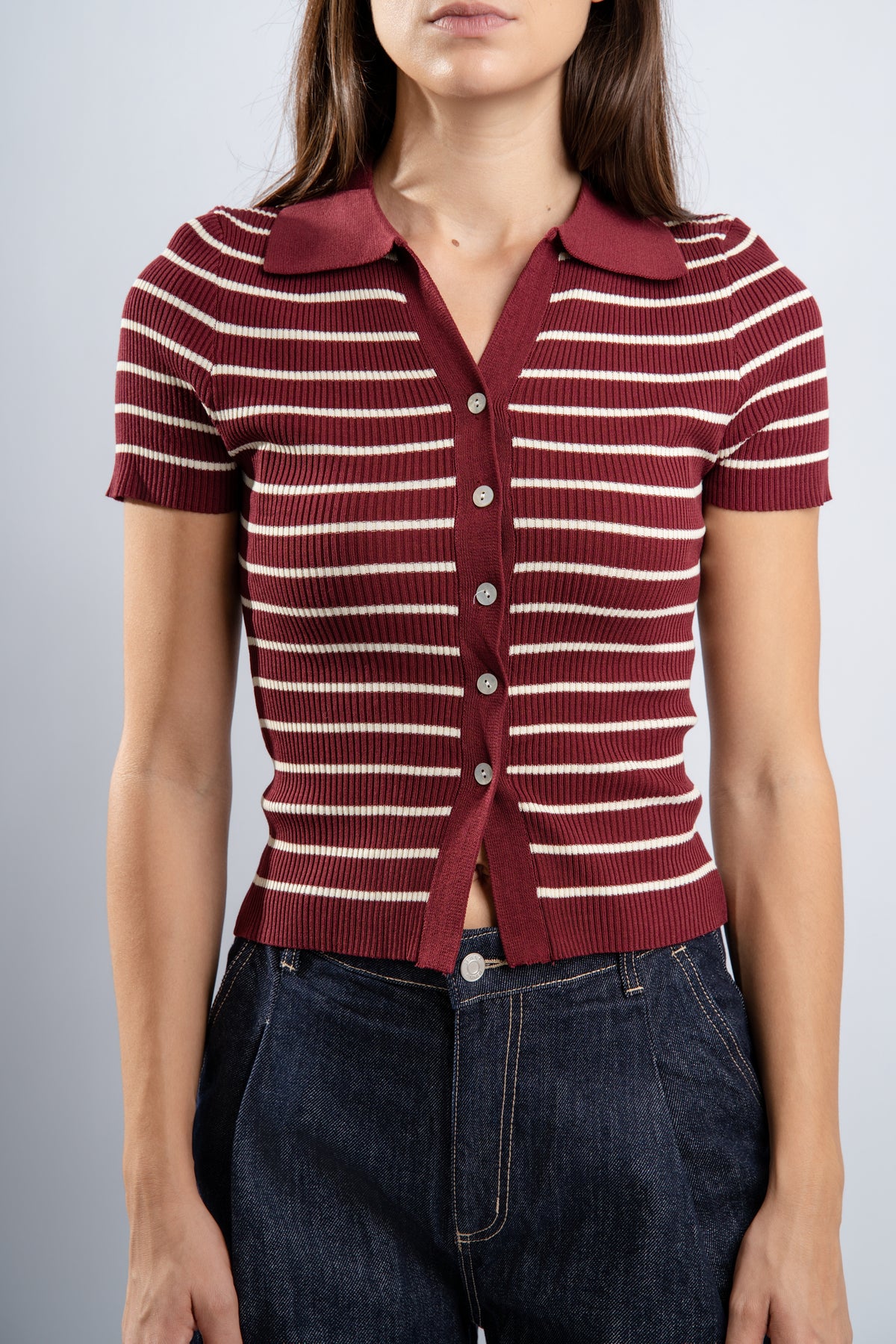 Polo rayé en maille bordeaux