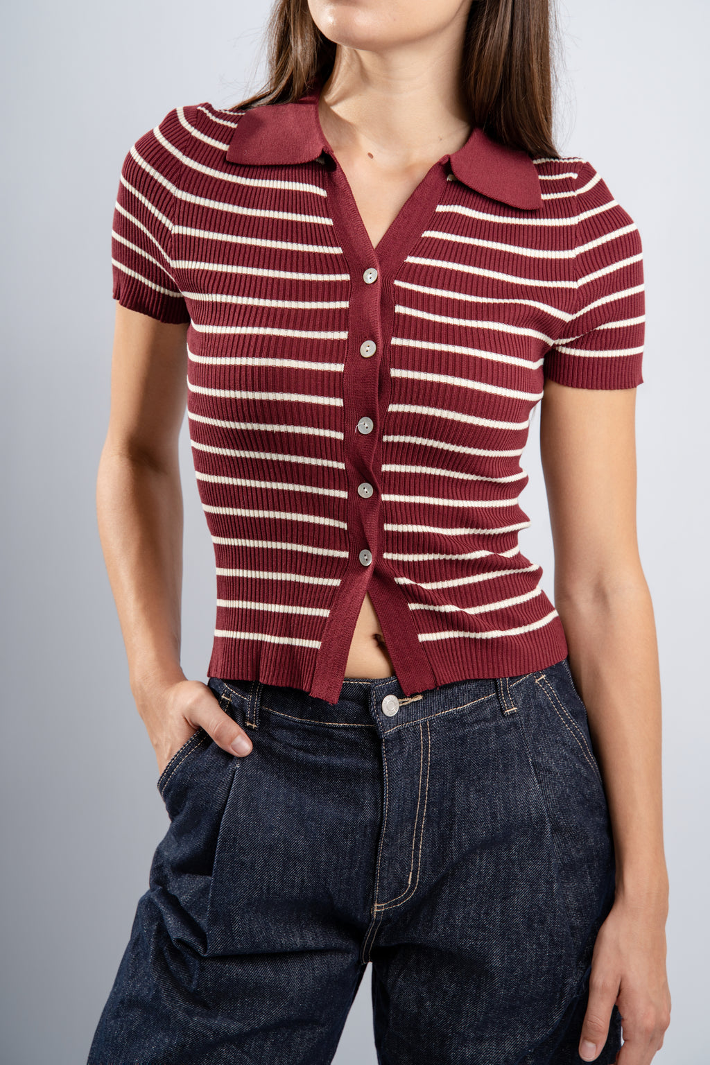Polo rayé en maille bordeaux