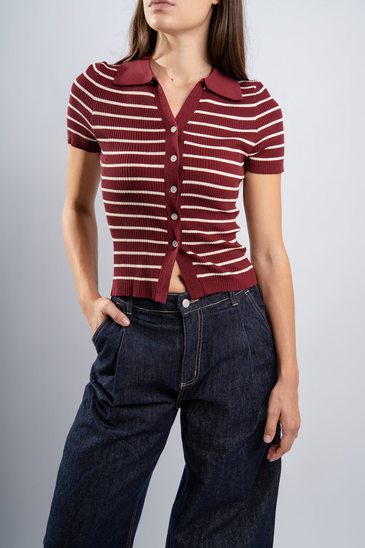 Polo rayé en maille bordeaux